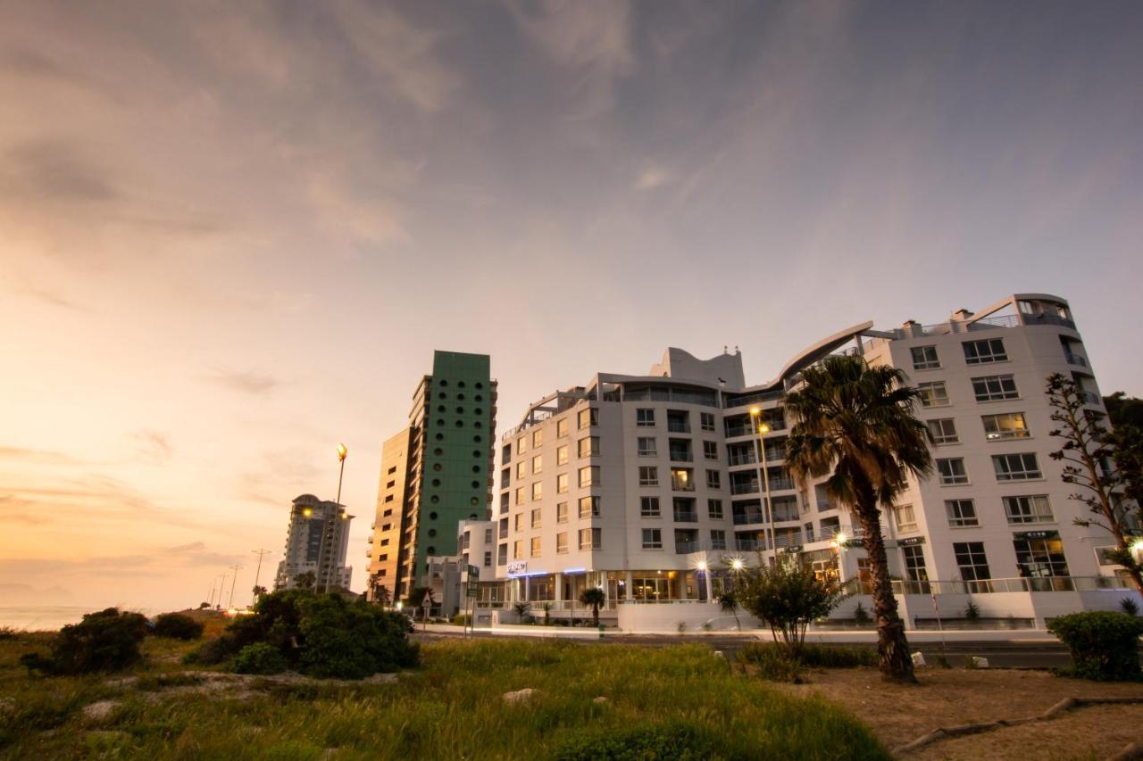 Ocean Breeze Hotel Strand Buitenkant foto