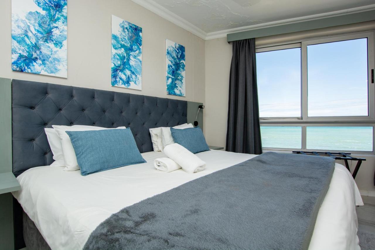 Ocean Breeze Hotel Strand Buitenkant foto