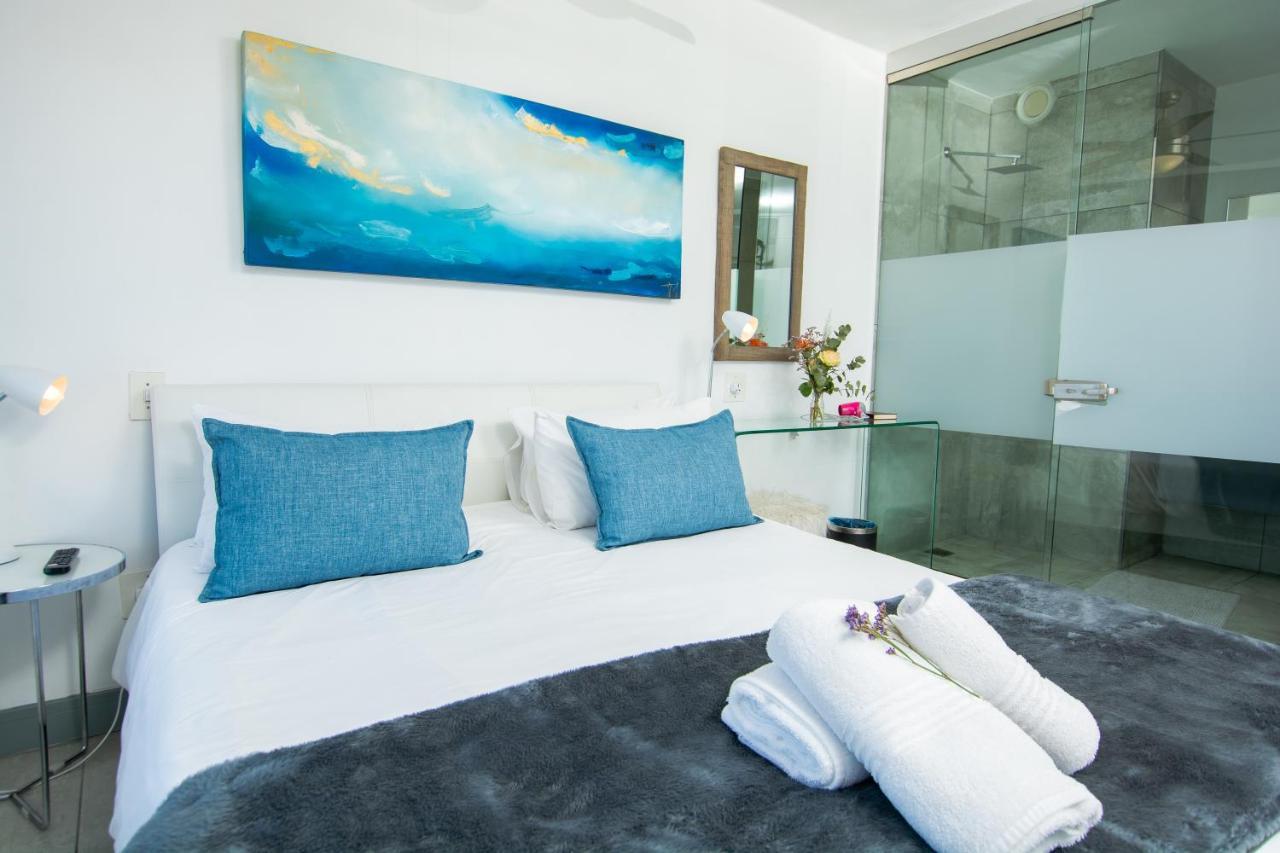 Ocean Breeze Hotel Strand Buitenkant foto