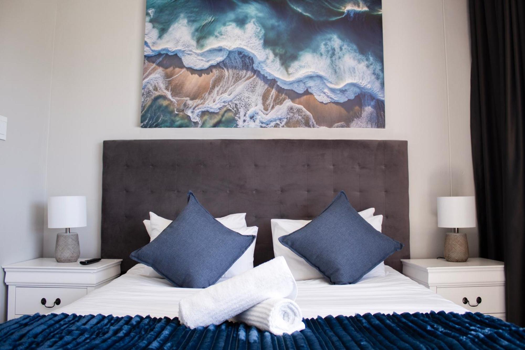 Ocean Breeze Hotel Strand Buitenkant foto
