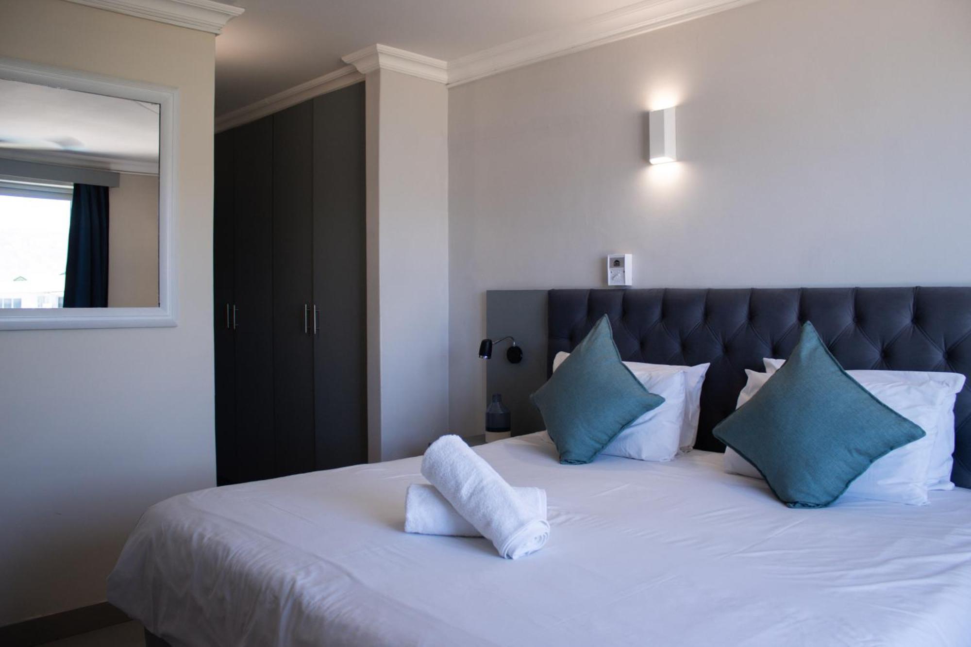 Ocean Breeze Hotel Strand Buitenkant foto