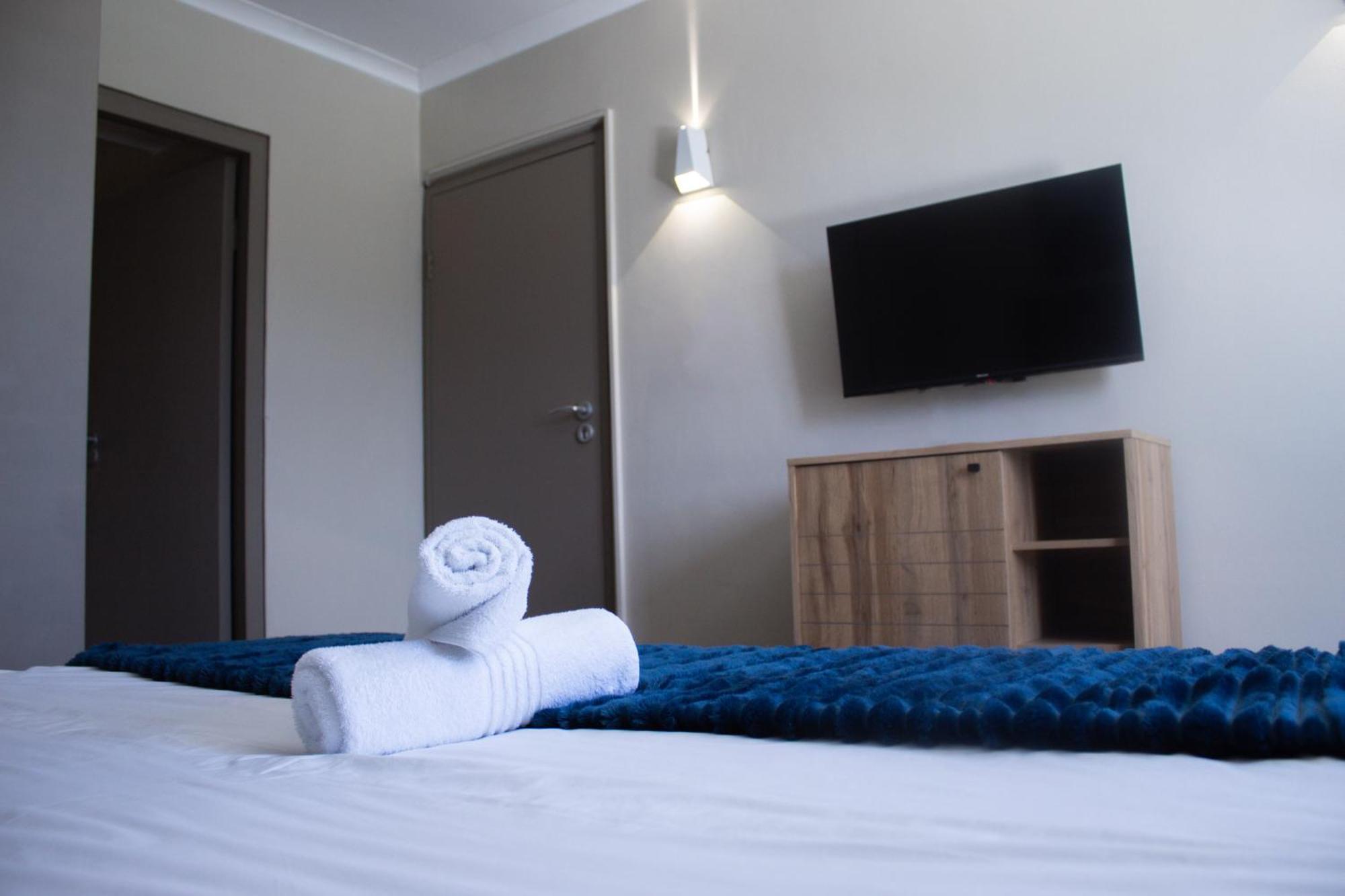 Ocean Breeze Hotel Strand Buitenkant foto
