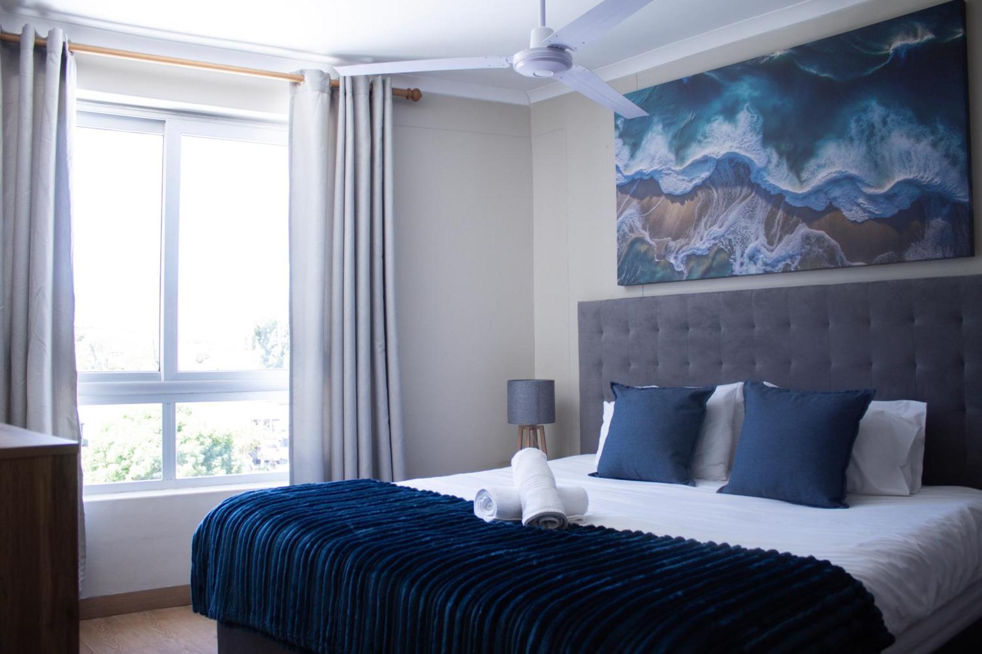Ocean Breeze Hotel Strand Buitenkant foto